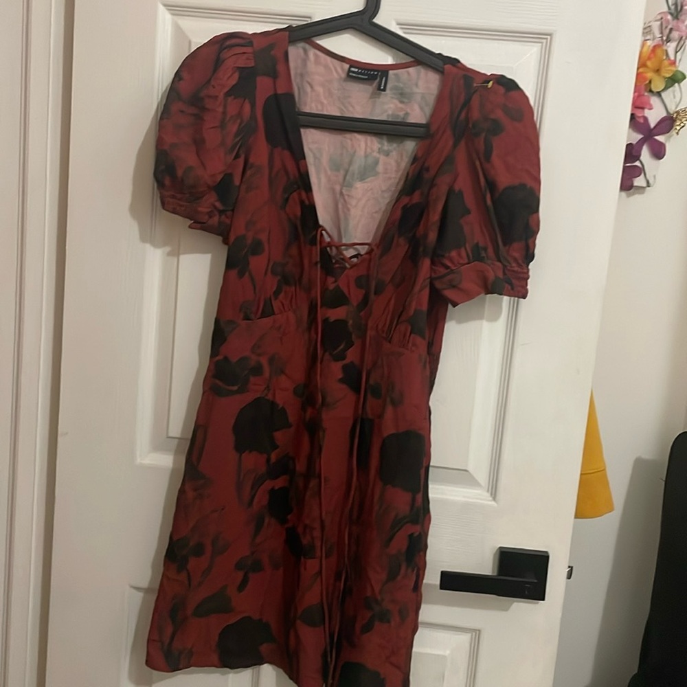 Mini dress with tie up front and puffy sleeves